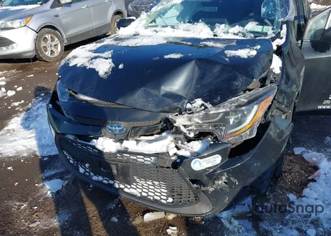 2021 Toyota Corolla Hybrid Le from USA, damaged, VIN JTDEAMDE3MJ021408